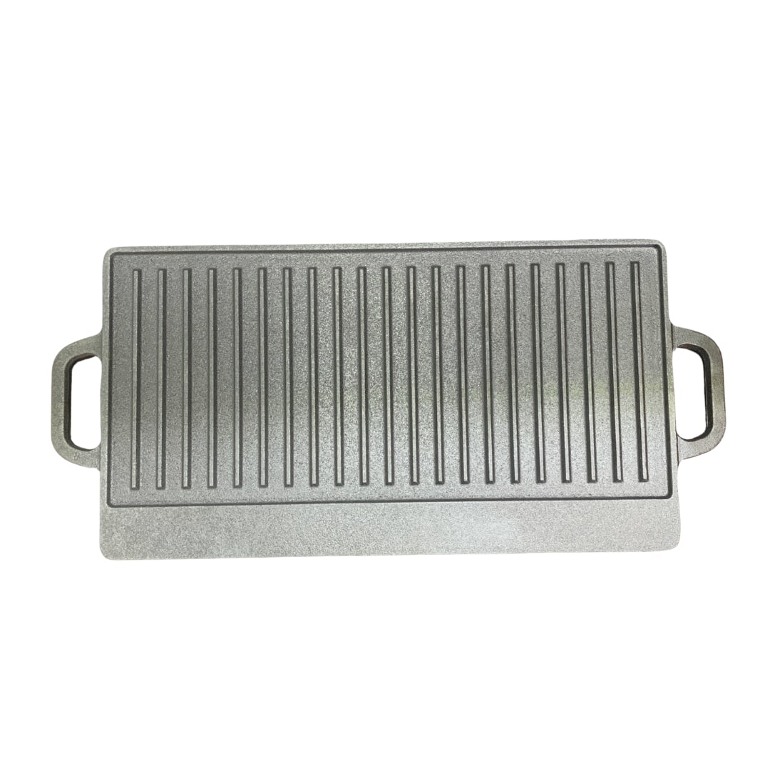 Detalle de la superficie de hierro fundido macizo de la parrilla reversible de 50 cm